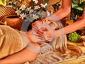 Woman getting facial massage