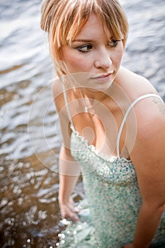 Woman getting her dress wet