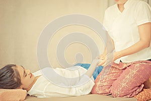 Woman is getting her hand massaged in Spa
