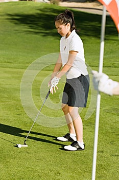 Woman Getting Ready To Hit The Ball