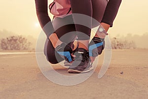 Woman getting ready to start running