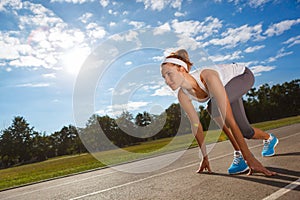 Woman getting ready to start on