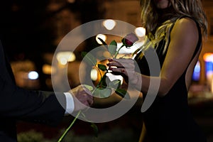 Woman getting rose on first date photo