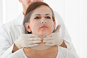 Woman Getting Thyroid Gland Control photo