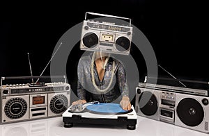 Woman with ghettoblaster as a head Djing