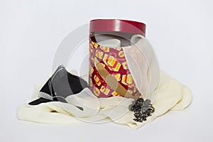 Woman gift box containing a handkerchief and a broach