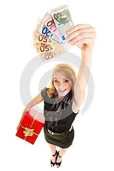 Woman with gift box and euro currency money banknotes.