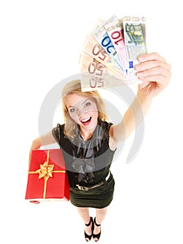 Woman with gift box and euro currency money banknotes.