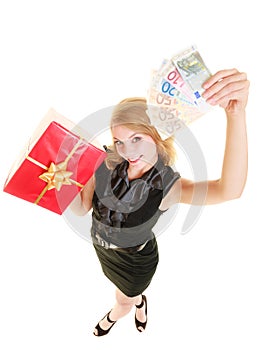 Woman with gift box and euro currency money banknotes.