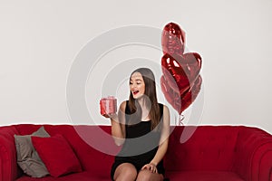 Woman with gift in Valentine Day