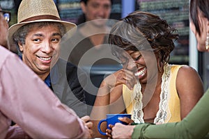 Woman Giggling with Friends