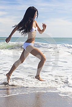 Woman Girl in Bikini Running on Beach