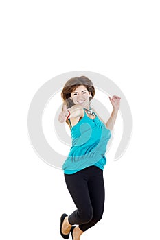 Woman or girl jumping with thumb up of joy excited isolated on