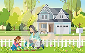 Woman and girl, mother and daughter, gardening together planting flowers in the garden. Concept motherhood child-rearing