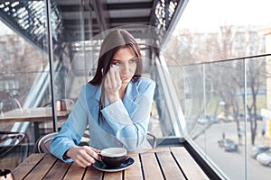 Woman girl about to cry wiping tears sneezing in a tissue