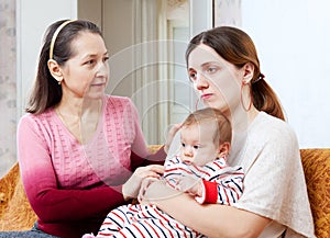 Woman gives solace to sad adult daughter