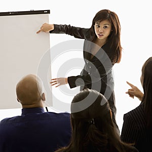 Woman giving presentation photo