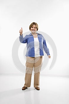Woman giving thumbs up.