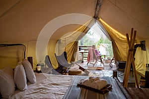 Woman glamping in forest
