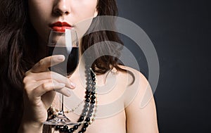 Woman with glass red wine