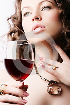 Woman with glass red wine