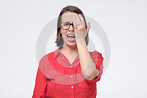 Woman in glasses checking eyesight exam. I need new glasses