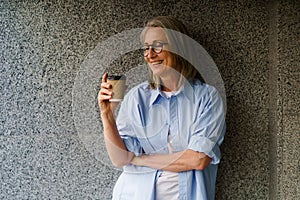 Woman With Glasses Holding Coffee Cup