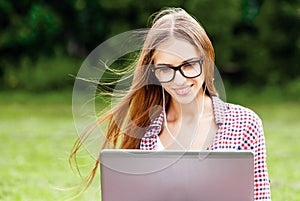 Woman In Glasses Using Laptop
