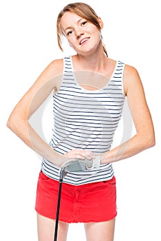 Woman in glove for game leans on golf club on white