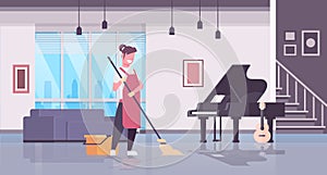 Woman in gloves and apron washing floor girl using mop housewife doing housework cleaning concept modern living room