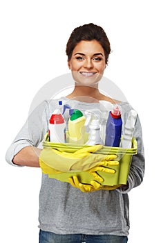 Woman in gloves holding different cleaning stuff
