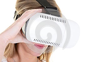 Woman in goggles mask experiencing virtual reality vr as new entertainment device