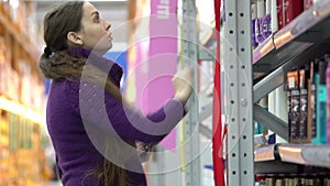 Woman Going Shopping With Check List On Pad