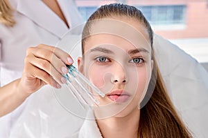 Woman is going to receive facelift, procedure mesothreads lifting skin