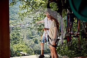 Woman going on a zipline adventure. girl on zipline