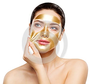 Woman Gold Mask, Beautiful Model Removing Golden Facial Skin Cosmetic, Beauty Skincare and Treatment