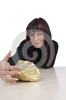 Woman with a gold nugget