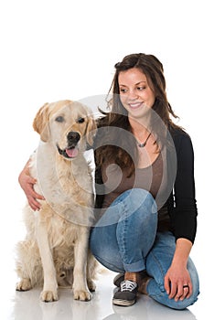 Woman with golden retriever dog on white background