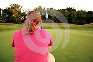 Woman on golf course