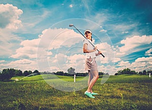 Woman on a golf field