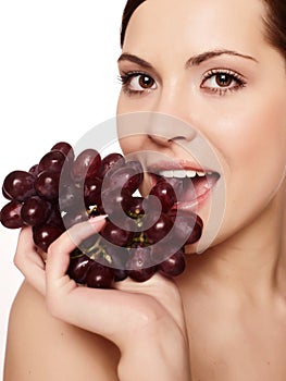 Woman with grape