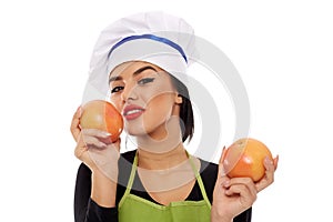 Woman with grapefruits