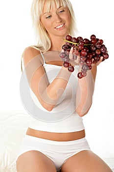 Woman with grapes