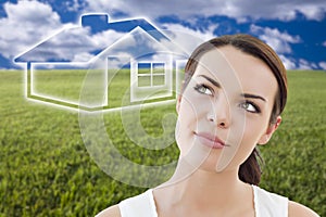 Woman and Grass Field with Ghosted House Figure Behind