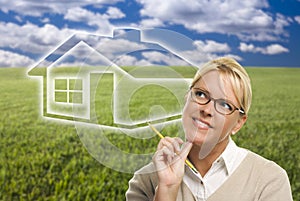 Woman and Grass Field with Ghosted House Figure Behind