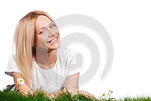 Woman on grass with flowers