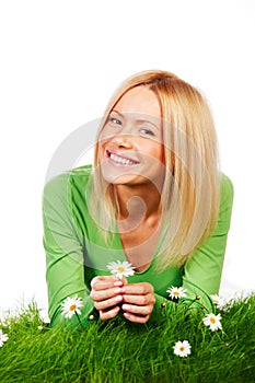 Woman on grass with flowers