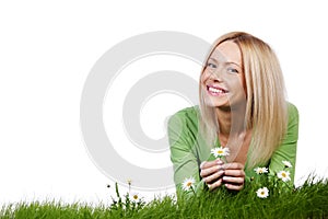 Woman on grass with flowers