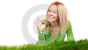 Woman on grass show OK