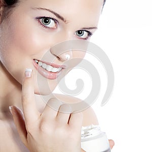 Woman with great makeup and face cream